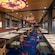 An artist rendering of the dining room at the Pixar Market Restaurant on the Disney Adventure, featuring Pixar themed artwork